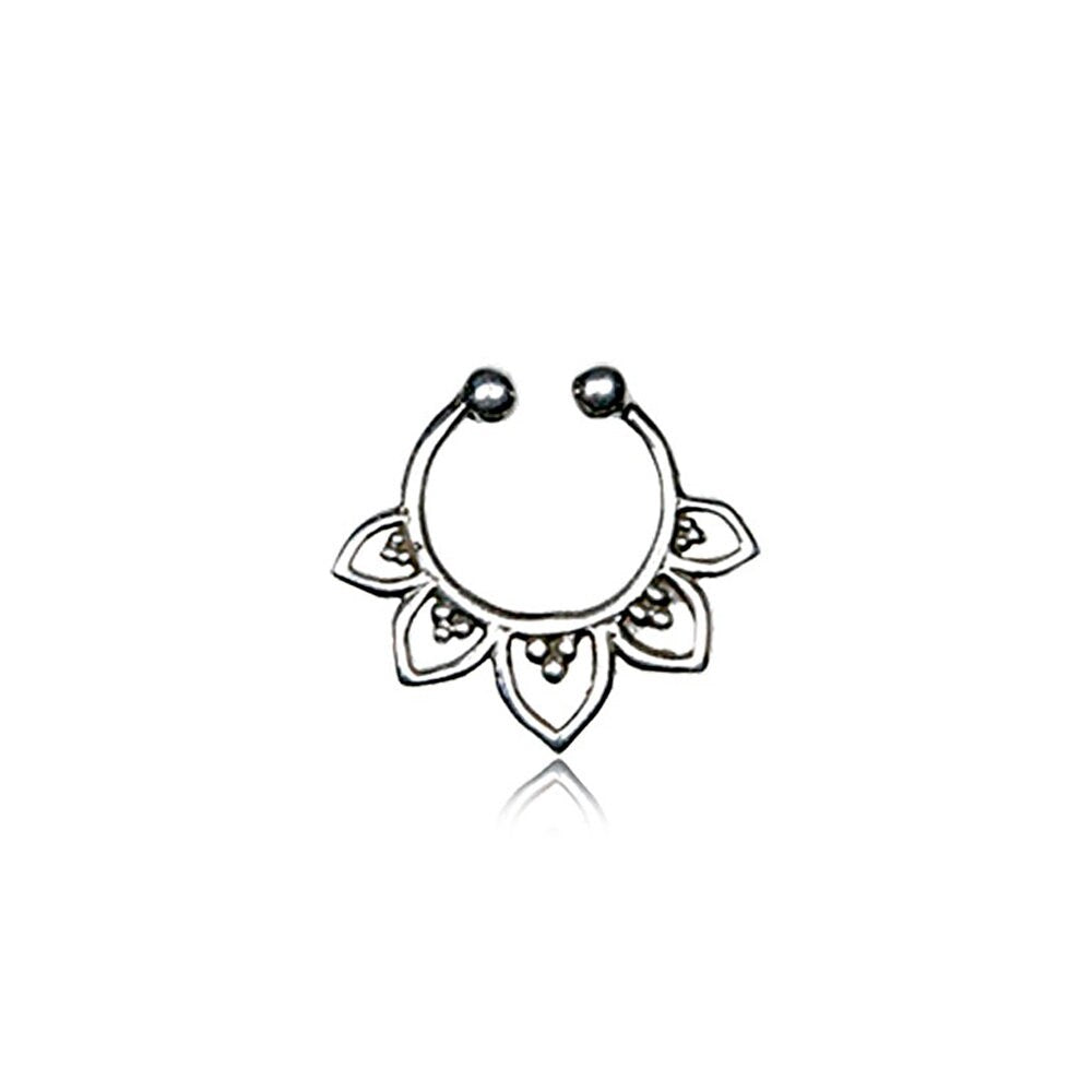 Introducing the Kaya Movement's elegant "Solara" Fake Septum, a no-pierce nose jewelry piece crafted from 925 pure silver. This delicate nose ring showcases a crescent shape adorned with an exquisite Mandala-inspired floral pattern featuring five petal-like motifs extending outward. The tips of the ring are designed with small circular ends for easy insertion.